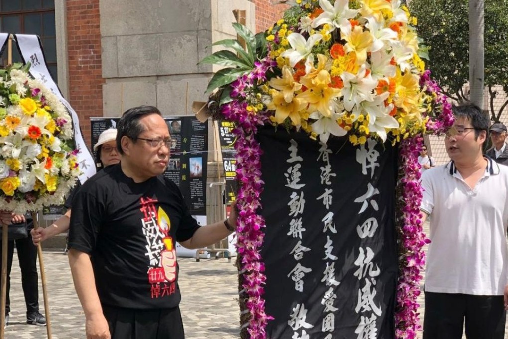 Albert Ho (left) attends the ceremony in Tsim Sha Tsui. Photo: RTHK