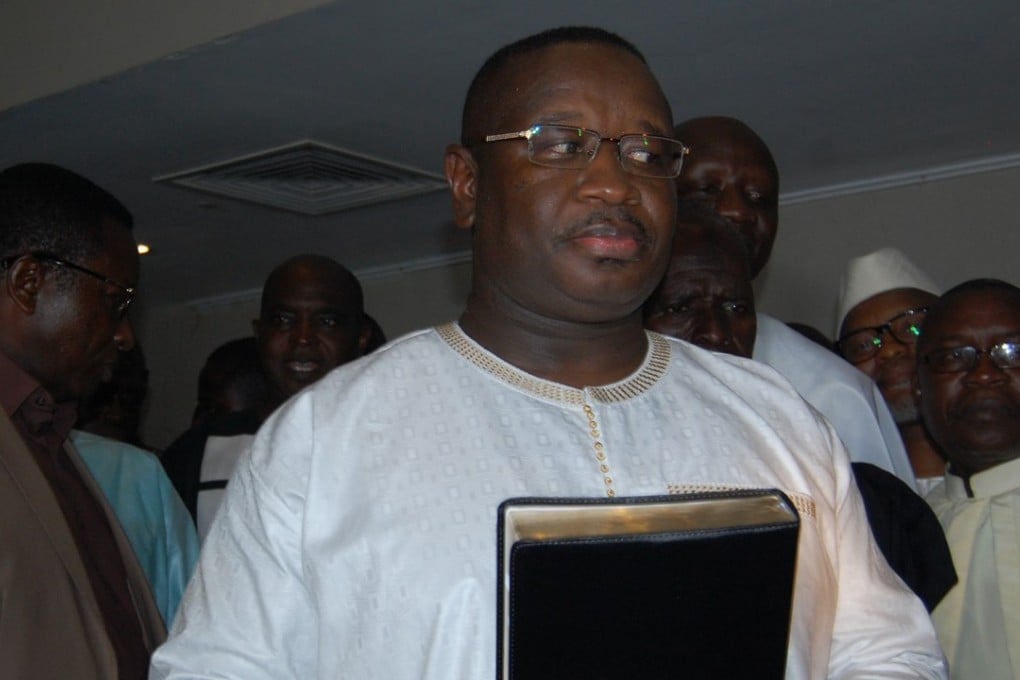 Julius Maada Bio prepares to take the oath of office as new president of Sierra Leone. Photo: AFP