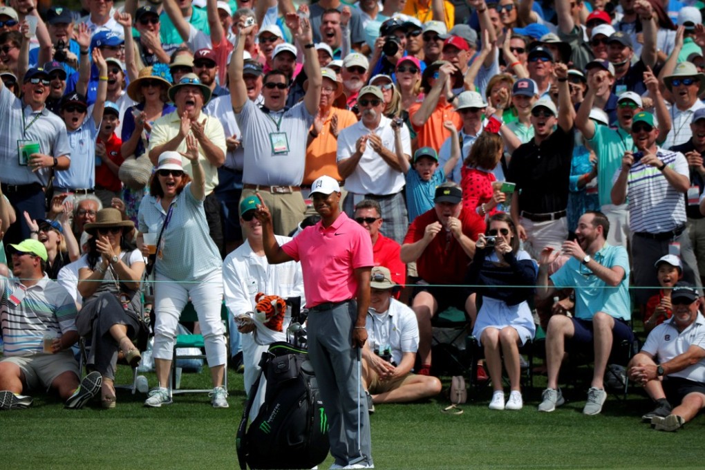 Fans flock to watch Tiger Woods in a practice round for the 2018 Masters at Augusta National. Photo: Reuters