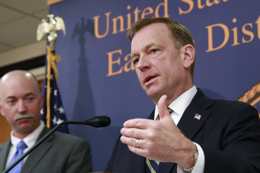 McGregor Scott, right, the United States Attorney For the Eastern District of California, flanked by FBI Special Agent in Charge Sean Ragan, discusses the months-long investigation that led to the raids. Photo: AP