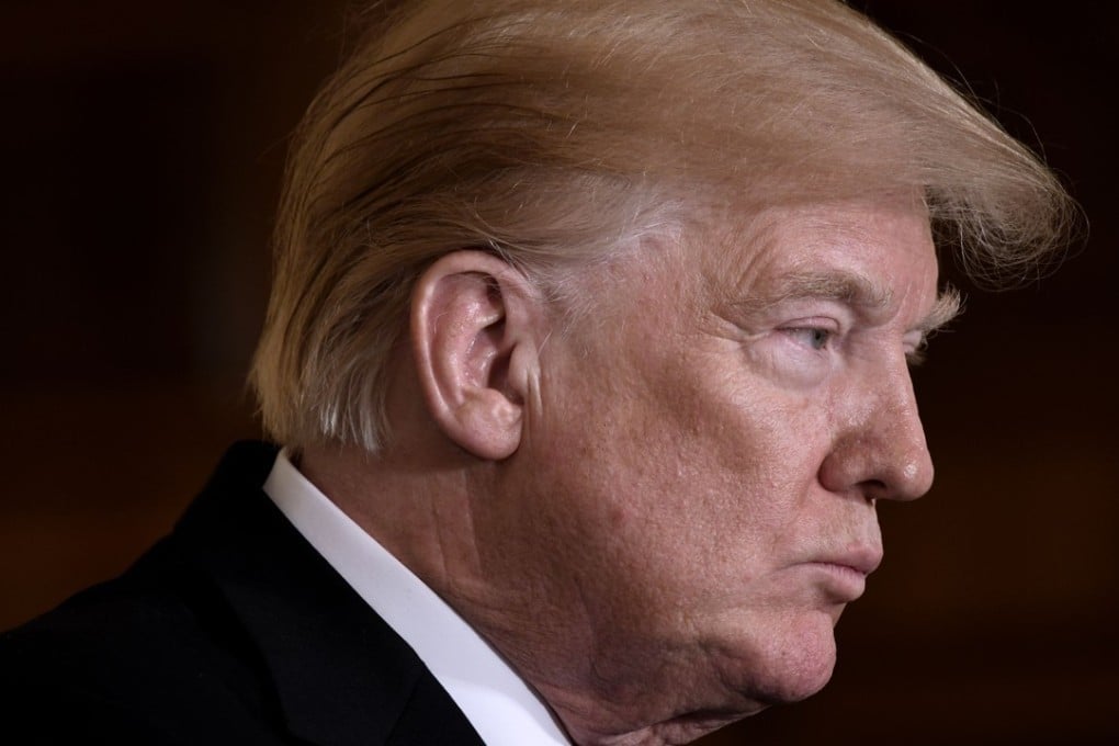 Trump-bashing, led by America’s liberal media, is now a global sport. But despite the daily bashing, Trump’s poll numbers show his voter base remains solid. Photo: AFP