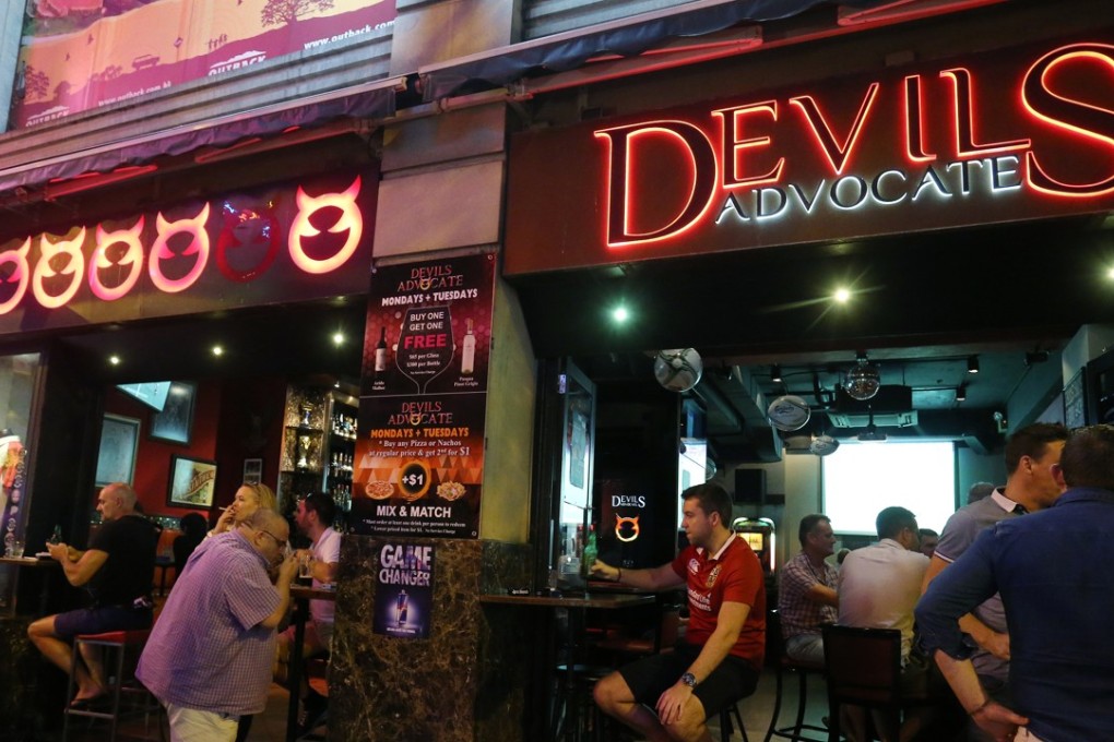 Patrons of Devil’s Advocate in Wan Chai during Hong Kong Rugby Sevens week. Photo: Dickson Lee