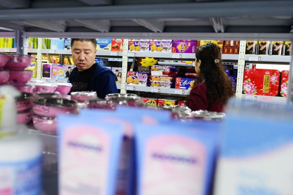 A store in Qingdao, eastern China’s Shandong province. Store owners will earn 8 cents for each device connecting to the new routers. Photo: AFP