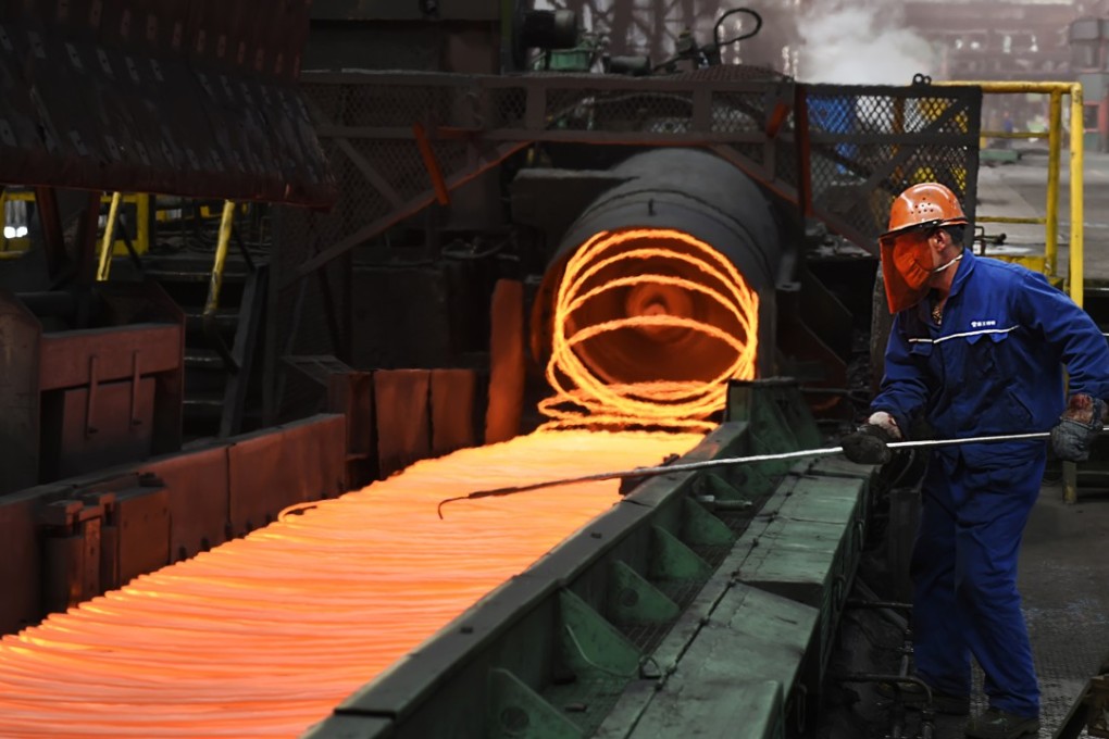 A steelworker in eastern China's Shandong province. China says it “firmly opposes” US President Donald Trump's tariff increase for imported steel and aluminium. Photo: AP