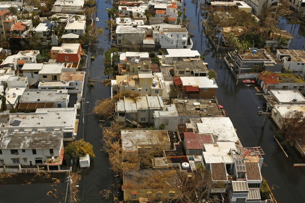 Puerto Rico lies flooded one week after Hurricane Maria struck in September 2017. Predictions for 2018 suggest more storms than usual - though hopefully nothing as severe as last year. Photo: Los Angeles Times via TNS