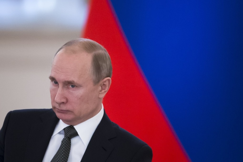 Russia's President Vladimir Putin chairs a meeting with members of the State Council at the Kremlin in Moscow, Russia on April 5. Photo: pool via Reuters