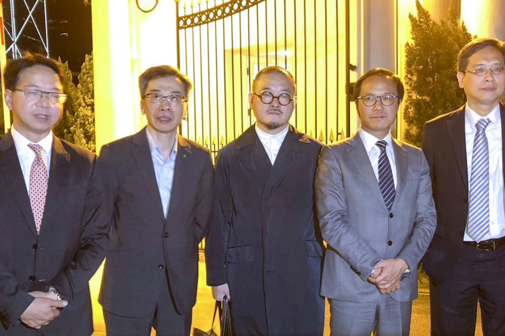 (From left to right) Pan-democrat lawmakers Charles Mok, Joseph Lee Kok-long, Shiu Ka-chun, Kenneth Leung Kai-cheong and Ip Kin-yuen, leave Government House in Central after their dinner meeting with Chief Executive Carrie Lam Photo: Handout