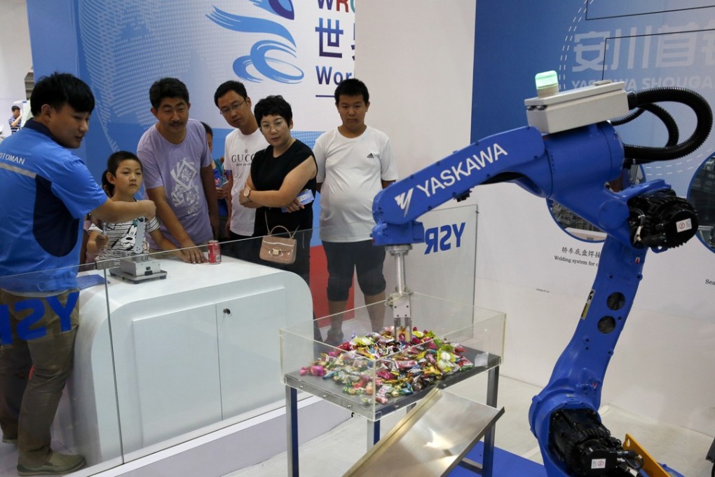 A Chinese-made industrial robot at the World Robot Conference in Beijing. President Xi Jinping is now focused on making state-owned enterprises stronger. Photo: AP