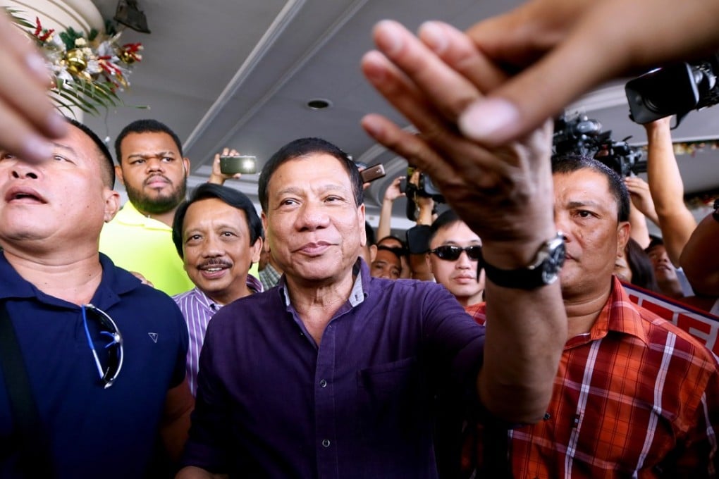 Rodrigo Duterte greets supporters during his successful campaign for president of the Philippines in 2015. Photo: AP