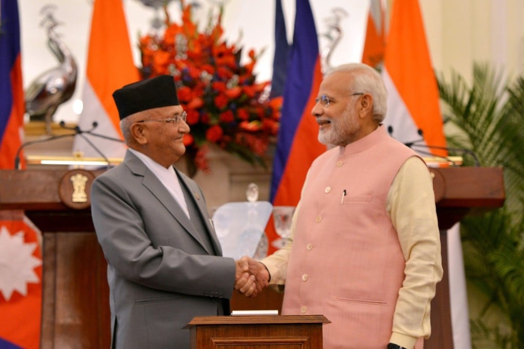 Nepalese Prime Minister Khadga Prasad Sharma Oli and Indian Prime Minister Narendra Modi. Photo: EPA