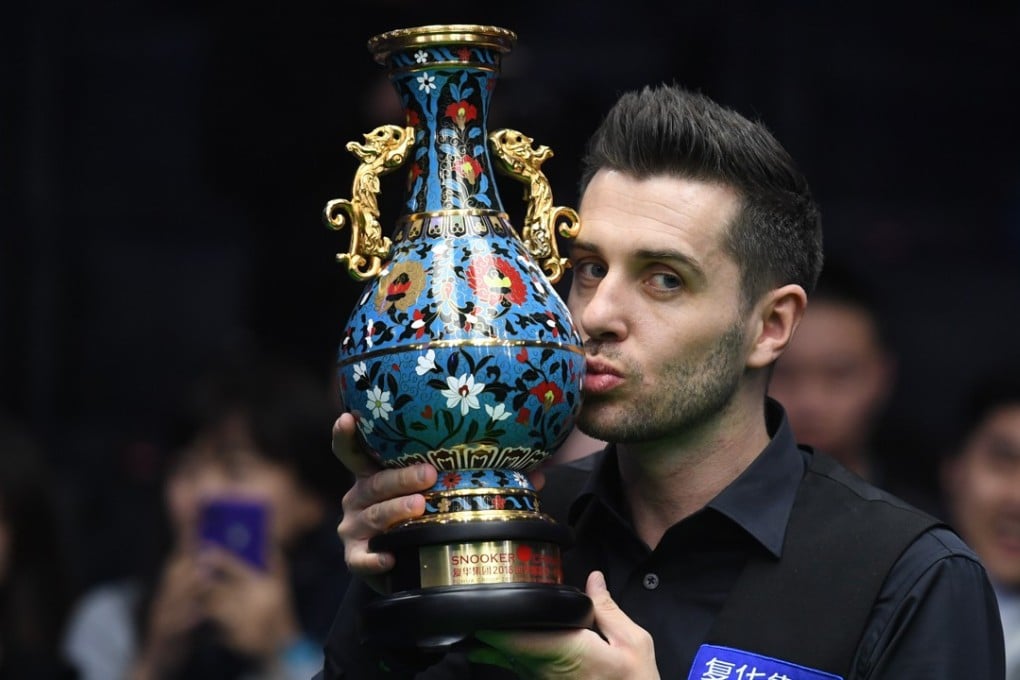 Mark Selby poses with the trophy at the China Open. Photo: Xinhua