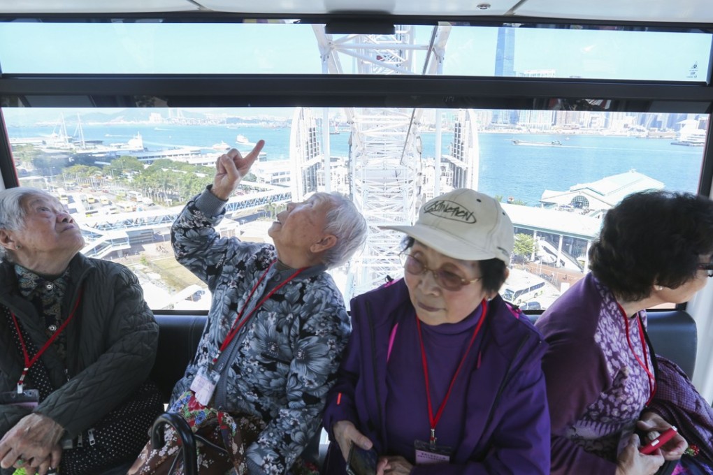 Four women aged between 76 and 99 enjoy a ride on the Hong Kong Observation Wheel at the Central waterfront last December, as part of a trip organised by young volunteers for single elderly people or those in residential care. Government figures show that about 150,000 elderly people in Hong Kong were living alone in 2016, accounting for 10 per cent of the city’s population aged 65 or above. Photo: Xiaomei Chen
