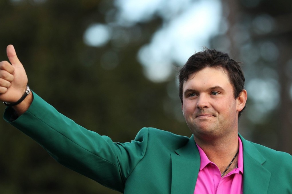 Patrick Reed of the United States celebrates during the green jacket ceremony after winning the 2018 Masters Tournament at Augusta National. Photo: AFP