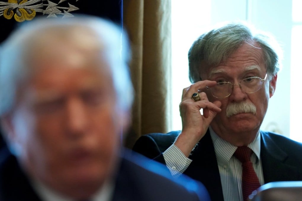 New National Security Adviser John Bolton listens as US President Donald Trump holds a cabinet meeting at the White House in Washington. Photo: Reuters