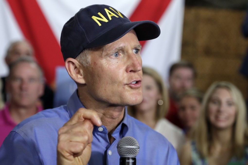 Florida Governor Rick Scott announces his bid to run for the US Senate at a news conference on Monday in Orlando, Florida. Photo: AP