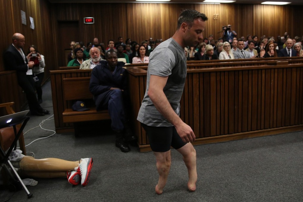 Oscar Pistorius' prosthetics lay on the floor as he walks on his stumps during argument in mitigation of sentence by his defense attorney Barry Roux in the High Court in Pretoria, South Africa, in June 2016. He has now lost his final appeal against his conviction for murdering his girlfriend, Reeva Steenkamp. Photo: Pool via AP