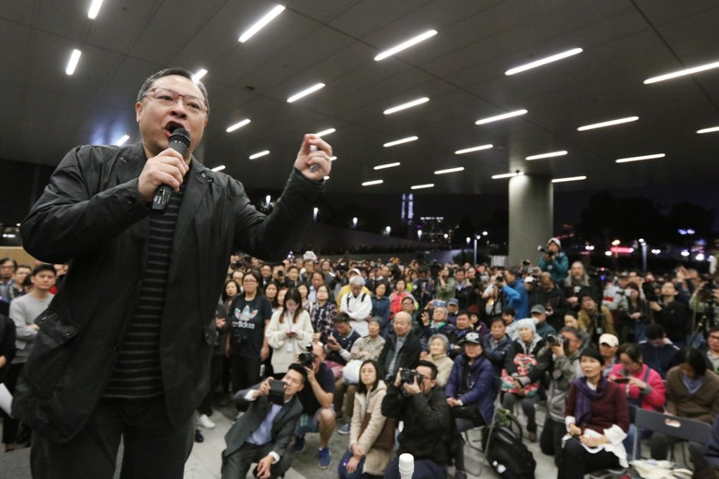 Benny Tai Yiu-ting addresses a rally in his support by pan-democrat lawmakers and the Civil Human Rights Front, outside the Legislative Council building, in Admiralty on April 7. Tai is at the centre of a political storm, with both the Hong Kong and central governments accusing him of advocating separatism. Photo: Felix Wong