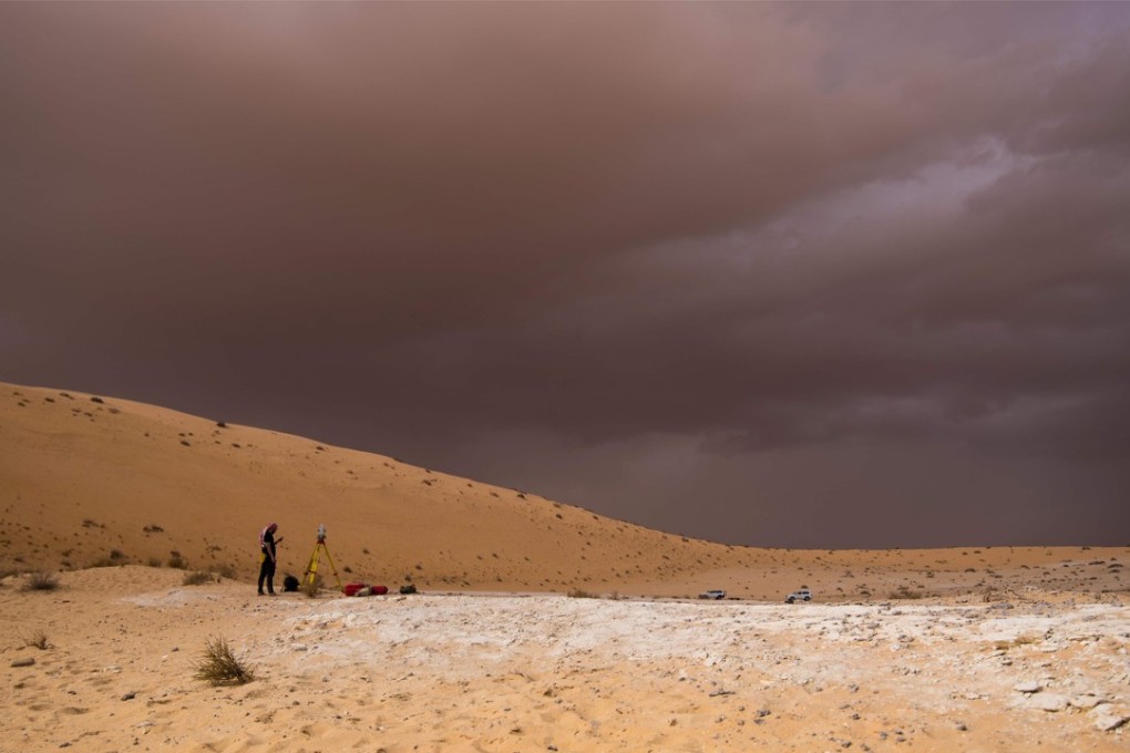The Al Wusta site in Saudi Arabia is mapped and surveyed on April 9. A lone finger bone unearthed in the desert suggests modern humans had penetrated deep into Arabia already 85,000 years ago, advancing the date of our species' African emigration by millennia. Photo: University of Oxford/Max Planck Institute via AFP