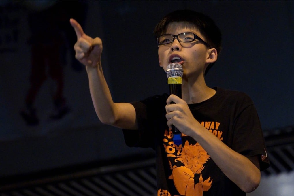 In this photograph taken on October 20, 2014, Joshua Wong, rallies demonstrators at Occupy Central in Admiralty,Hong Kong. Photo: AFP