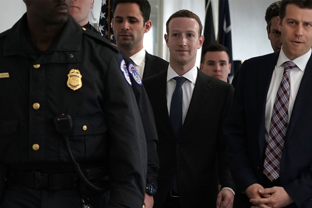 Facebook CEO Mark Zuckerberg (centre) arrives at a meeting with US Senator Bill Nelson of the Senate Committee on Commerce, Science, and Transportation on Capitol Hill in Washington on April 9. Zuckerberg has been called to testify before a few Congressional committees this week on the users data Facebook has shared with political operatives. Photo: Getty Images