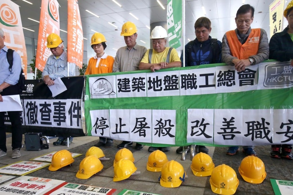 Concern groups, including the Hong Kong Confederation of Trade Unions, Construction Site Workers General Union and the Labour Party, and lawmaker Leung Yiu-chung (far left), protest outside the Legislative Council building, in Admiralty on April 12 last year. The demonstration was held ahead of a special meeting of the Legco manpower panel on occupational safety in the construction of the Hong Kong-Zhuhai-Macau bridge. Photo: David Wong