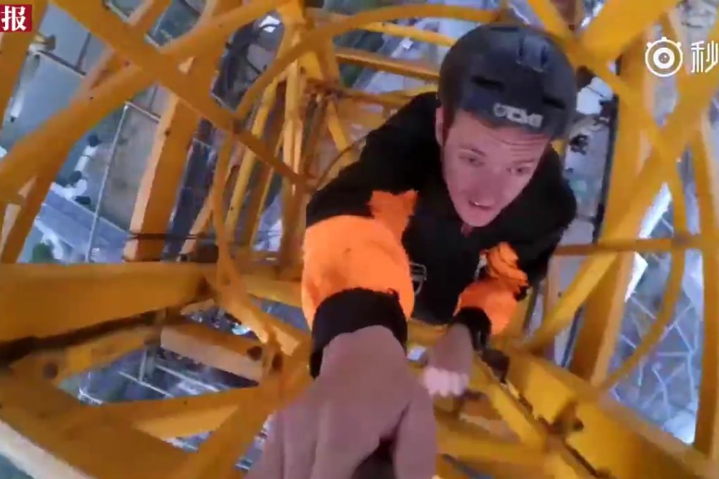 Russian extreme sportsman Alex Pykhov has scaled several buildings in China. Photo: Miaopai.com