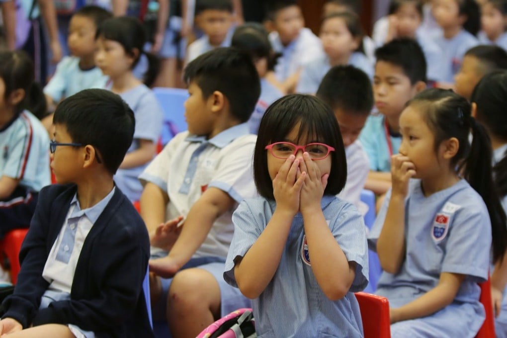 Primary schoolchildren in Tin Shui Wai. Parents can sometimes be hard on children, as they want to ensure that they do not lag behind peers in a competitive society. Photo: Xiaomei Chen