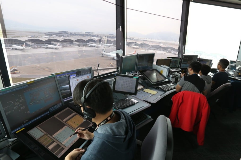 Air traffic controllers use the new ATMS at the north aerodrome tower of the Hong Kong International Airport, on November 25, 2016. The new system was launched earlier that month. Photo: Dickson Lee