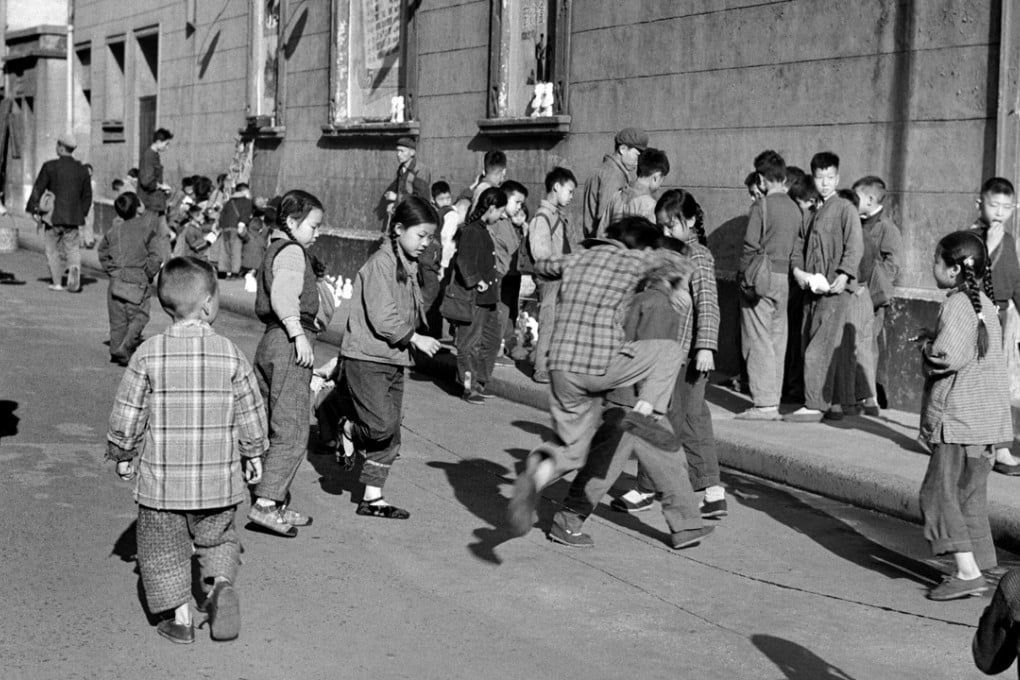 Children playing during the start of the new school year in Shanghai, in 1964, after the Great Famine but before the Cultural Revolution. Picture: AFP