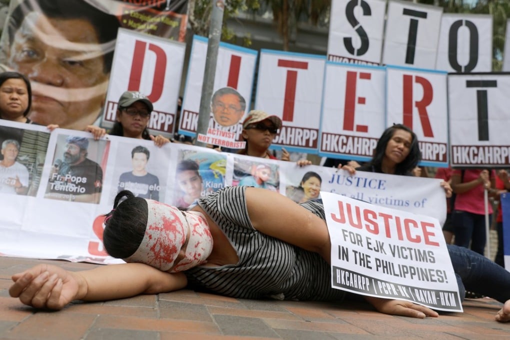 Protesters in Hong Kong act out the scene at an extrajudicial killing in the Philippines. Photo: Sam Tsang