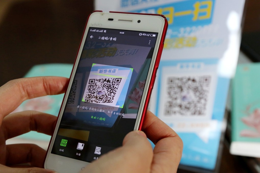 A QR code is used to pay for books at an unattended store in Zaozhuang, in China’s Shandong province. Photo: Xinhua