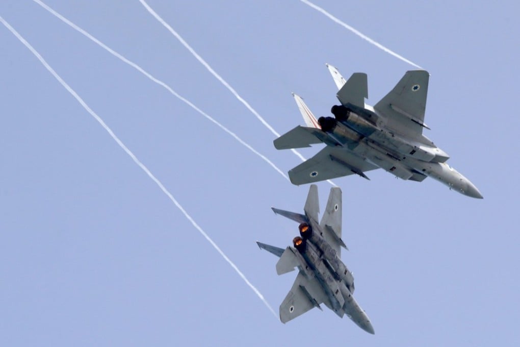 Israeli F-15 fighter jets rehearsing in Tel Aviv on Thursday for an air show to commemorate the 70th anniversary of the creation of Israel next month. Photo: AFP