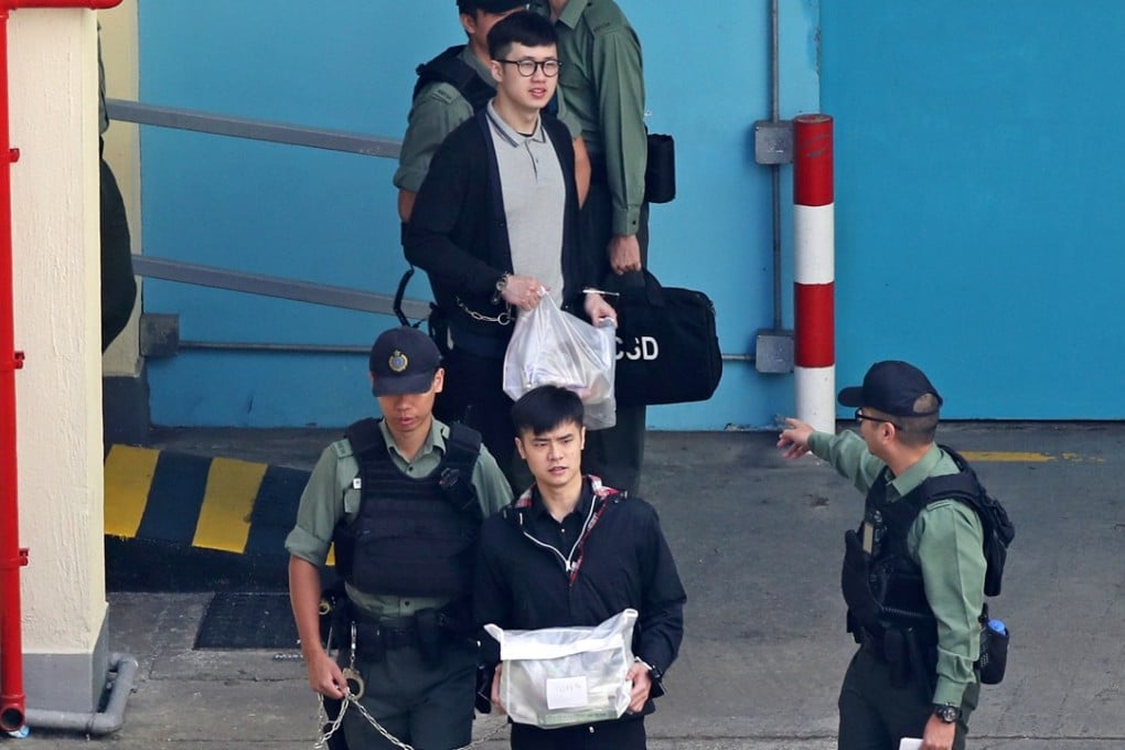 Keith Lau (centre top with glasses); and Cheung Sin-hang (centre bottom) being escorted away from Lai Chi Kok Reception Centre.