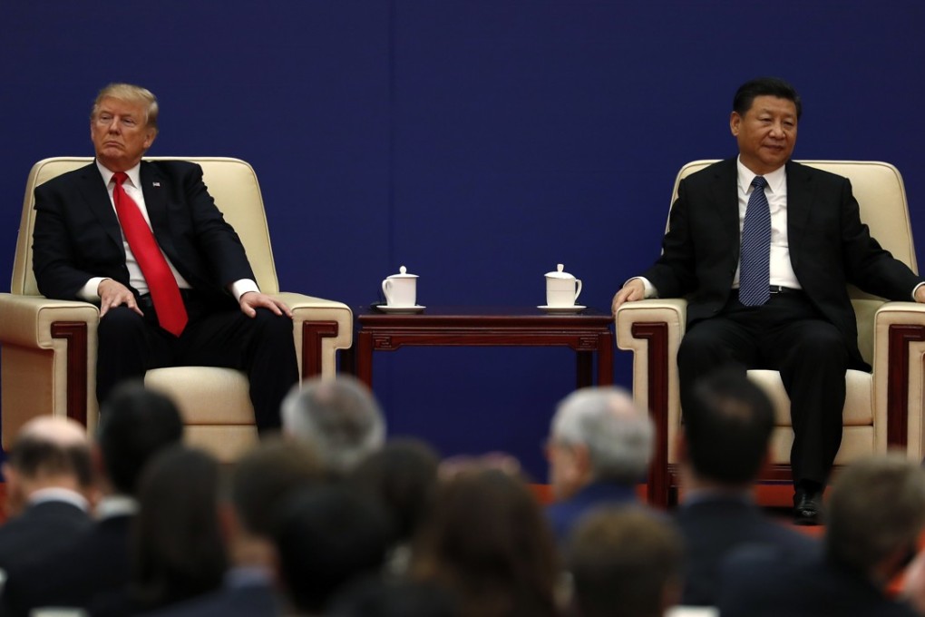US President Donald Trump with Chinese President Xi Jinping at a business event at the Great Hall of the People in Beijing. Photo: AP