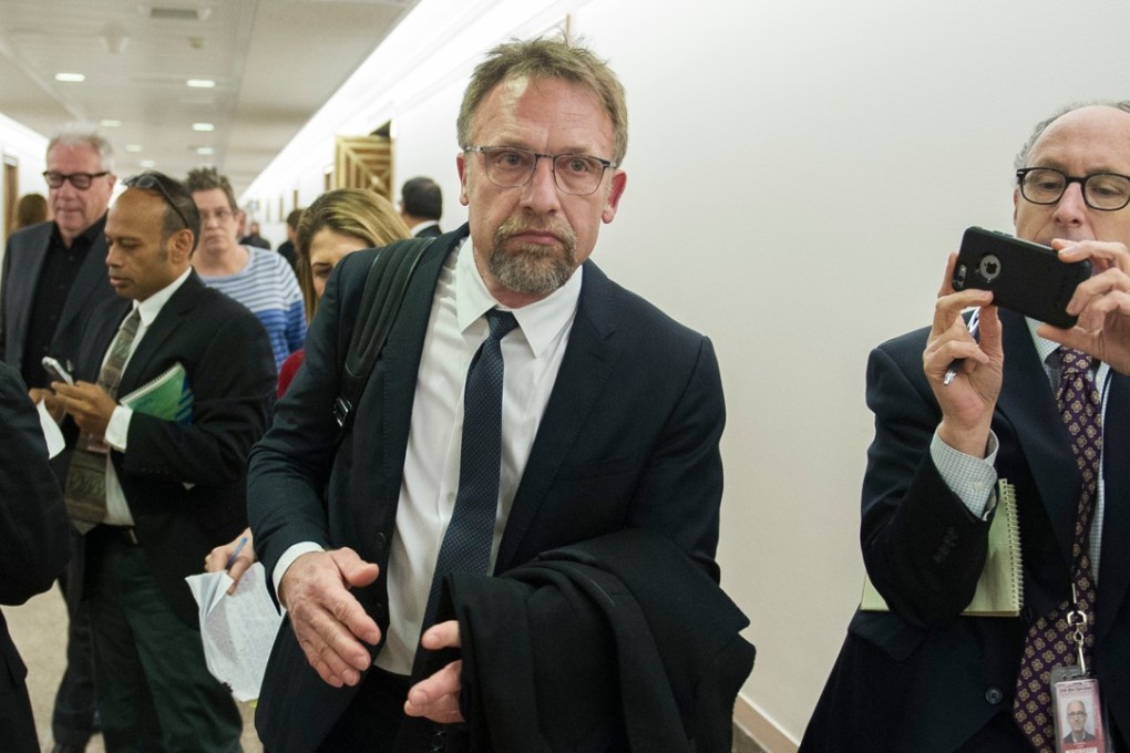 Backpage.com CEO Carl Ferrer leaves the Senate Homeland Security and Governmental Affairs subcommittee hearing on Capitol Hill in Washington. Photo: AP