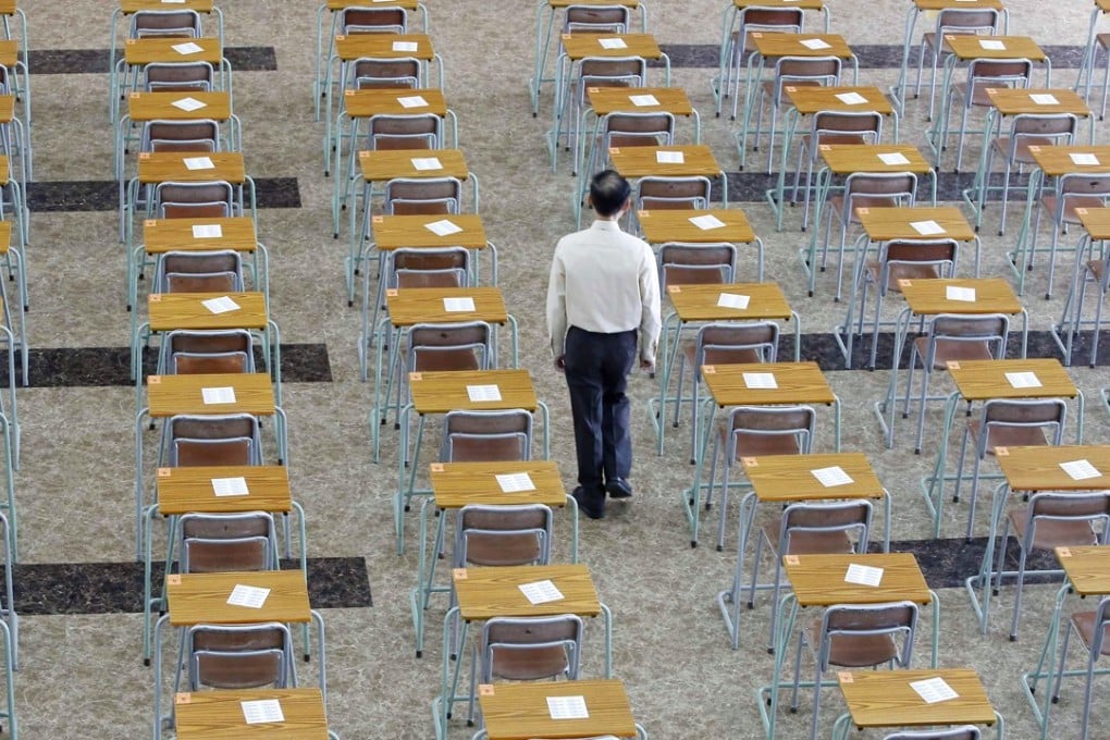 The exam hall being inspected before pupils sitting the DSE arrive, at the Kiangsu-Chekiang College in North Point, on April 9. Photo: Handout