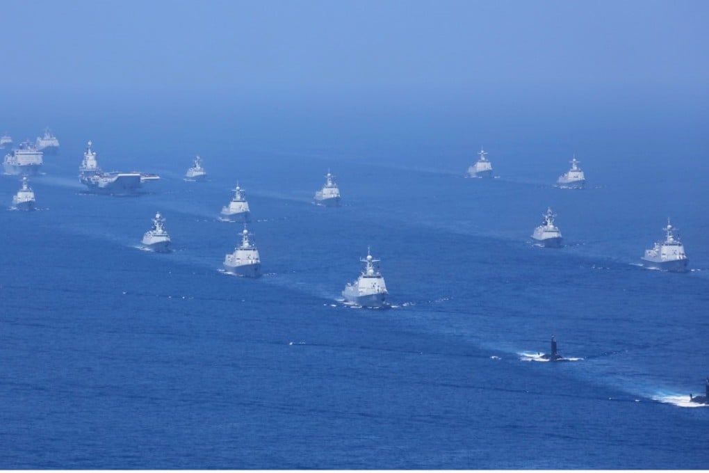 The aircraft carrier Liaoning, submarines and dozens of warships take part in the South China Sea naval parade on Thursday. Photo: Xinhua
