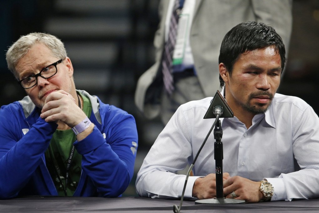 Trainer Freddie Roach (left) is out as Manny Pacquiao’s trainer after more than 15 years and 34 fights together. Photo: AP