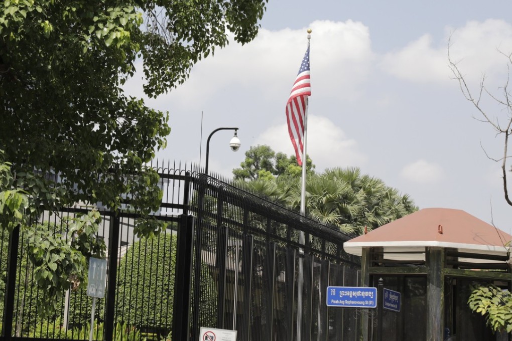 A US flag is seen at the US Embassy in Phnom Penh, Cambodia, where 32 staff members were fired for sharing pornographic material. Photo: EPA