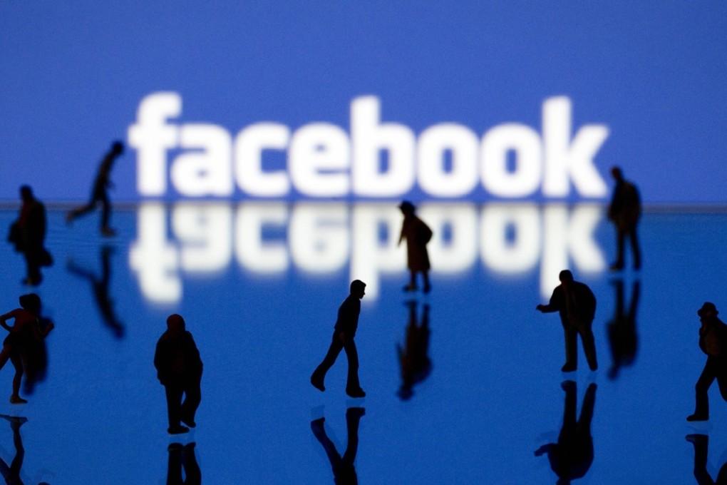 Picture taken on May 12, 2012 in Paris shows an illustration made with figurines set up in front of Facebook's homepage. Facebook, already assured of becoming one of the most valuable US firms when it goes public later this month, now must convince investors in the next two weeks that it is worth all the hype. Top executives at the world's leading social network have kicked off their all-important road show on Wall Street – an intense marketing drive ahead of the company's expected trading launch on the tech-heavy Nasdaq on May 18. AFP PHOTO/JOEL SAGET