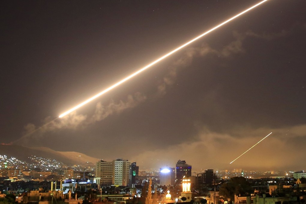 Missile lights up the sky over Damascus during a US-led air strike in the early hours of Saturday morning. Photo: AP