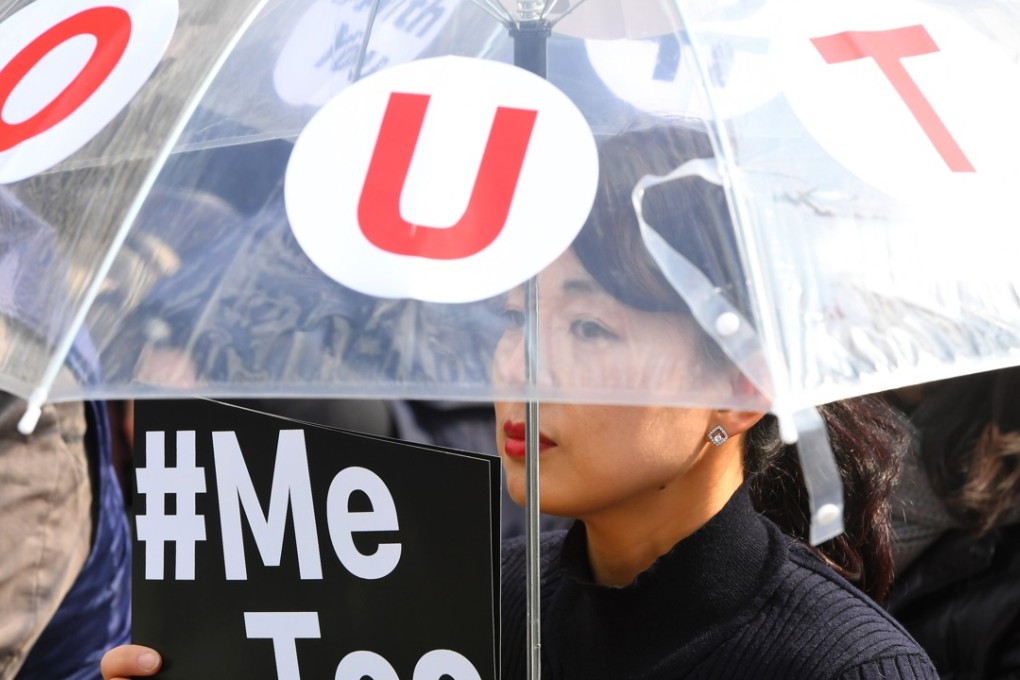 A South Korean demonstrator marks International Women’s Day. Photo: AFP