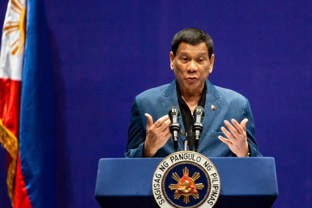 Duterte addresses the crowd at Kai Tak Cruise Terminal. Photo: AFP