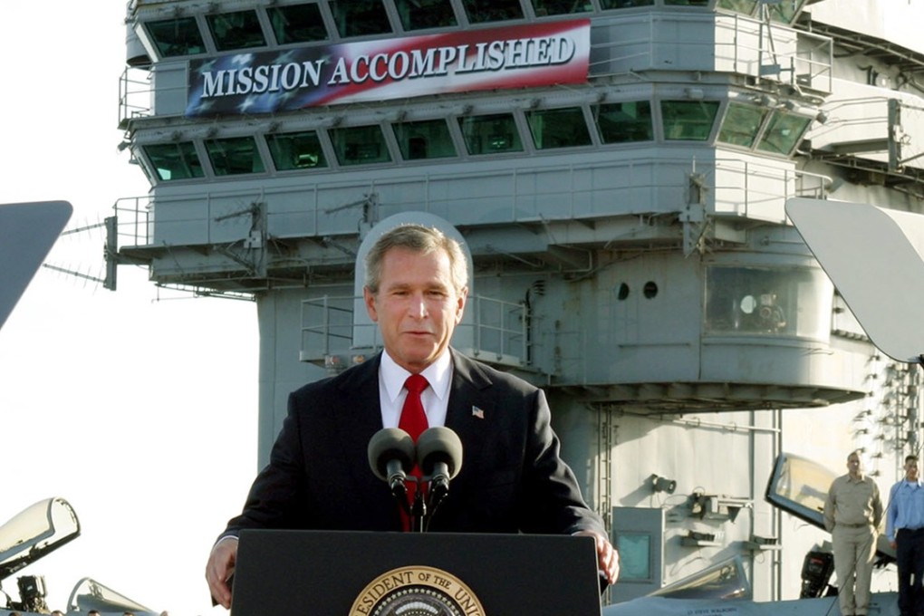 US President George W. Bush declares the end of major combat in Iraq in 2003 as he speaks aboard the aircraft carrier USS Abraham Lincoln. He was wrong. File photo: AP