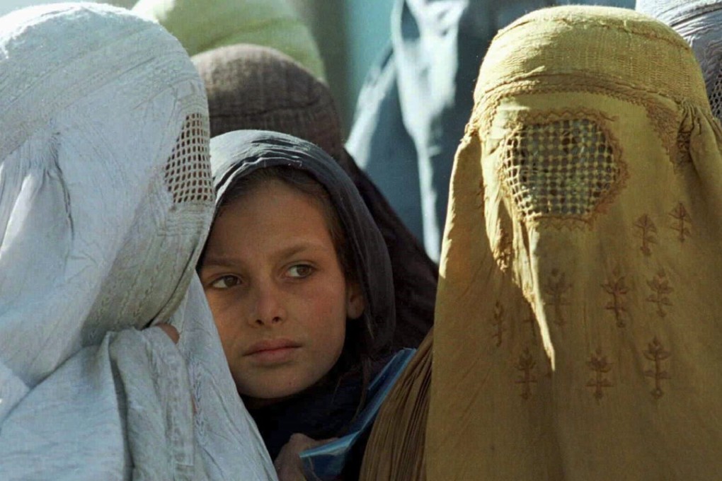 Two Afghan women wearing the all-covering burka. Photo: Reuters