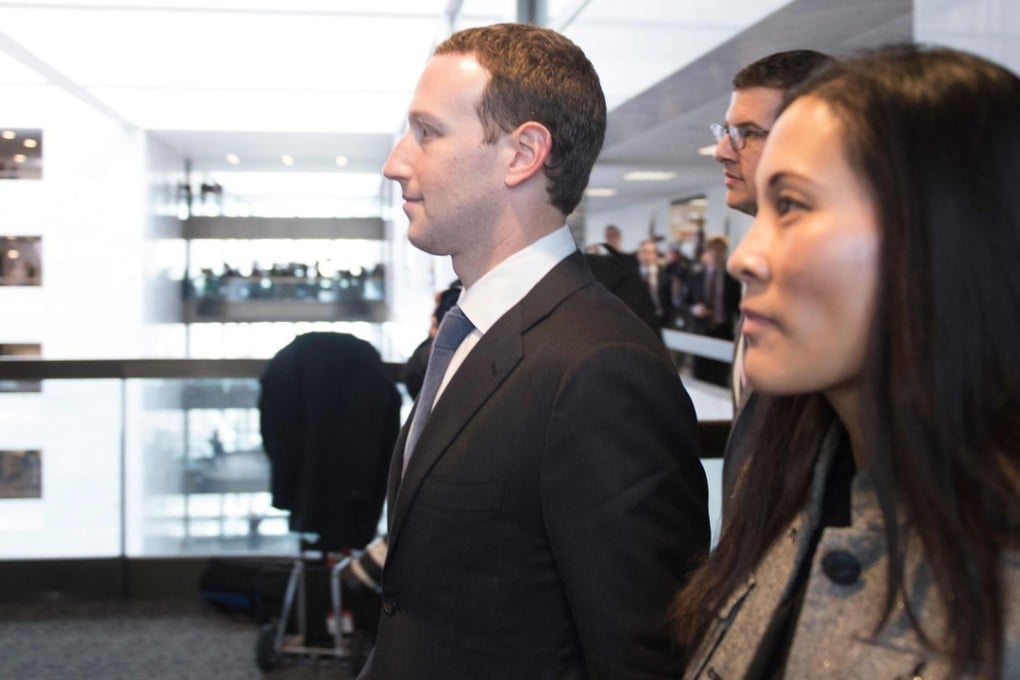 Mark Zuckerberg and wife Priscilla Chan depart US Senator Bill Nelson’s office on Capitol Hill in Washington on April 9. Photo: Agence France-Presse