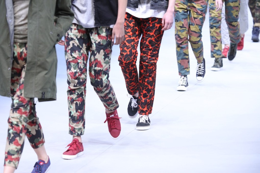 Models present a creation from the G-Star & Dickies which is presented by JD, the online shopping platform, during China Fashion Week in Beijing on March 29, 2017. Photo: Simon Song