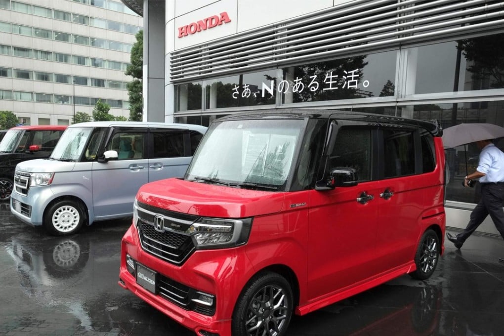 Honda Motor's new N-BOX mini-vehicles at its headquaters in Tokyo. AFP PHOTO