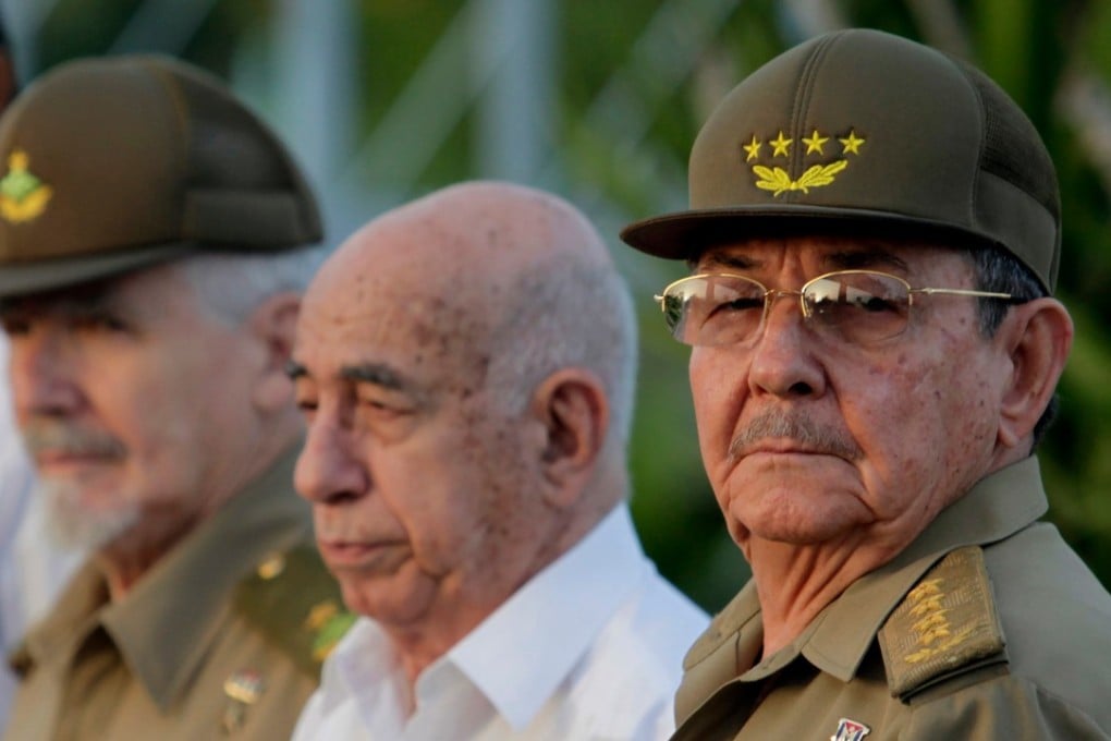 In this July 26, 2009 file photo, Cuba's authorities, from right, President Raul Castro, Vice-President Jose Ramon Machado Ventura and Revolutionary Commander Ramiro Valdes attend a rally marking Cuba’s Day of National Rebellion in Holguin, Cuba. Photo: AP