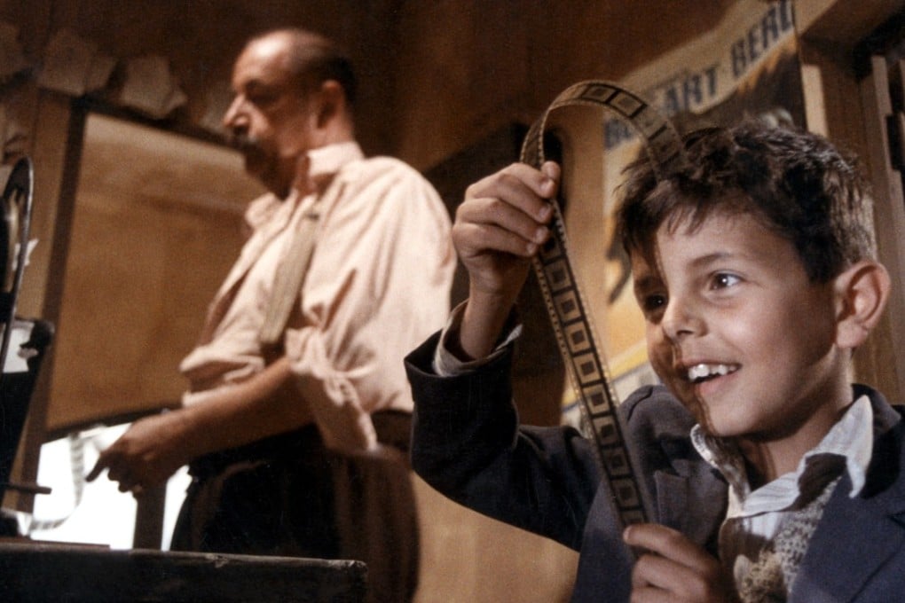 Salvatore Cascio (right) and Philippe Noiret in Cinema Paradiso.